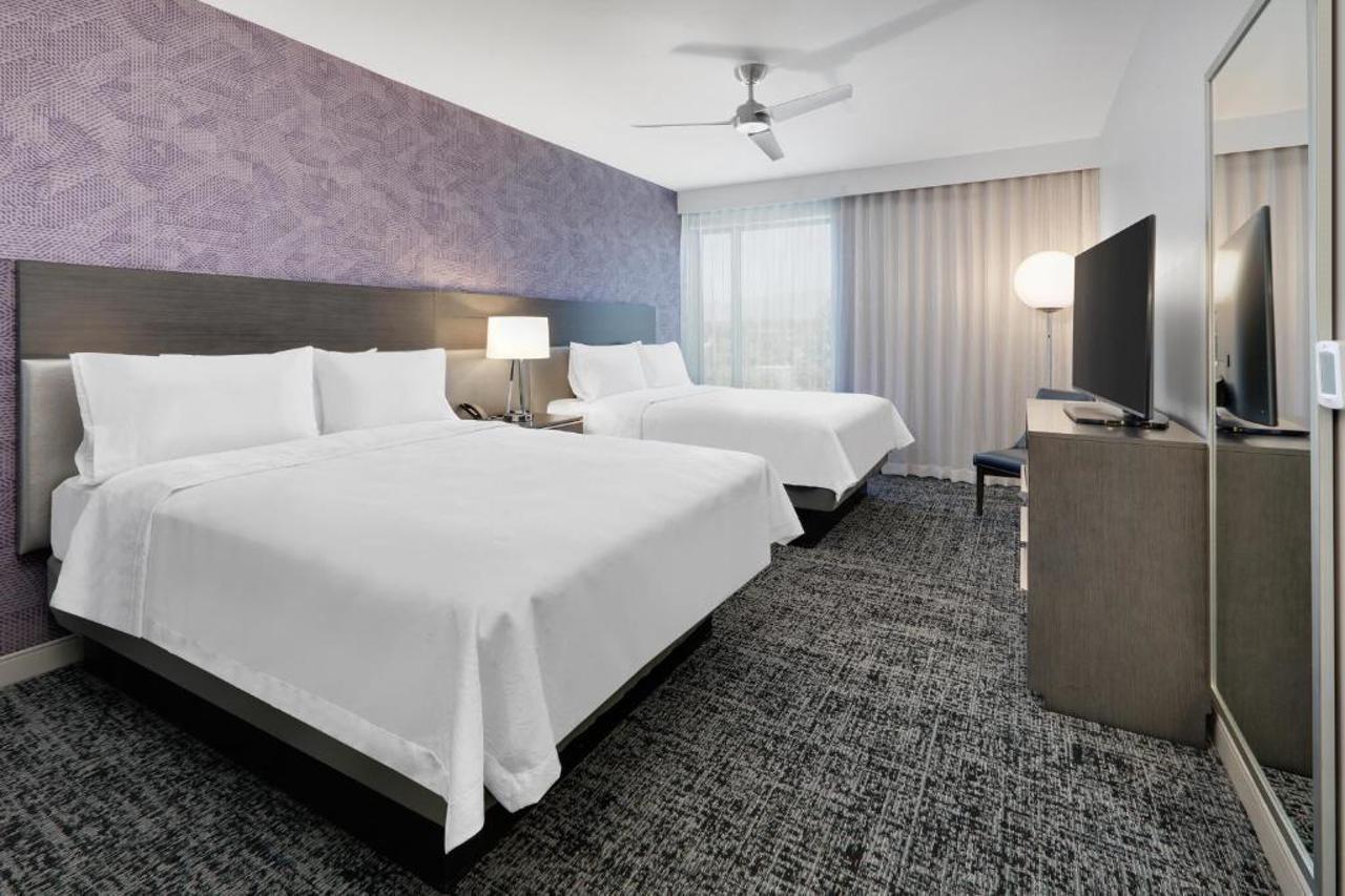 Luxe Grand Hotel Apartments Sardzsa Kültér fotó A guest room at the Hilton Garden Inn in San Francisco